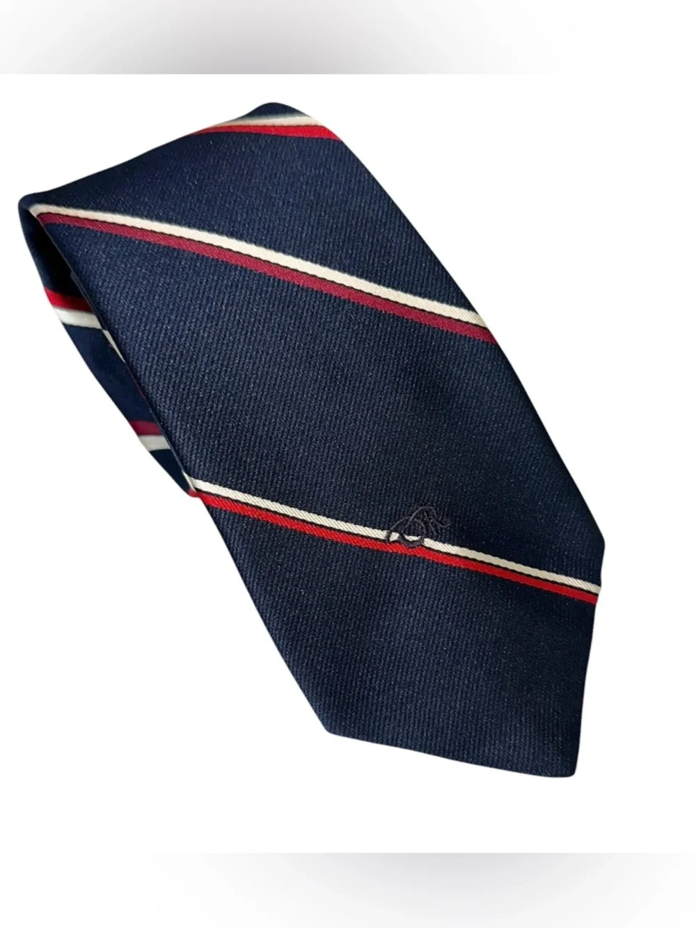 Oscar de la Renta tie gently